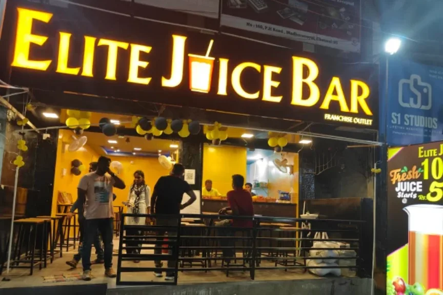 Acrylic Glow Sign Board mounted on Juice Bar